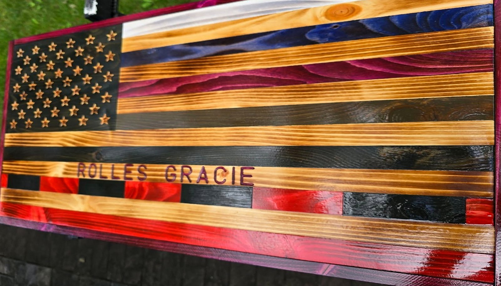 Fire-colored stripes flag with engraved name